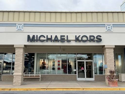 Who Makes Michael Kors Bags